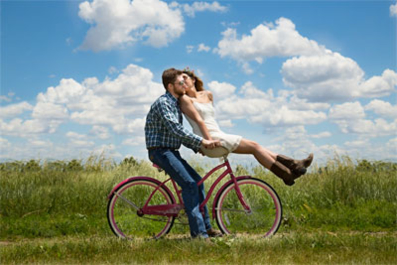 Boy & Girl on a bicycle